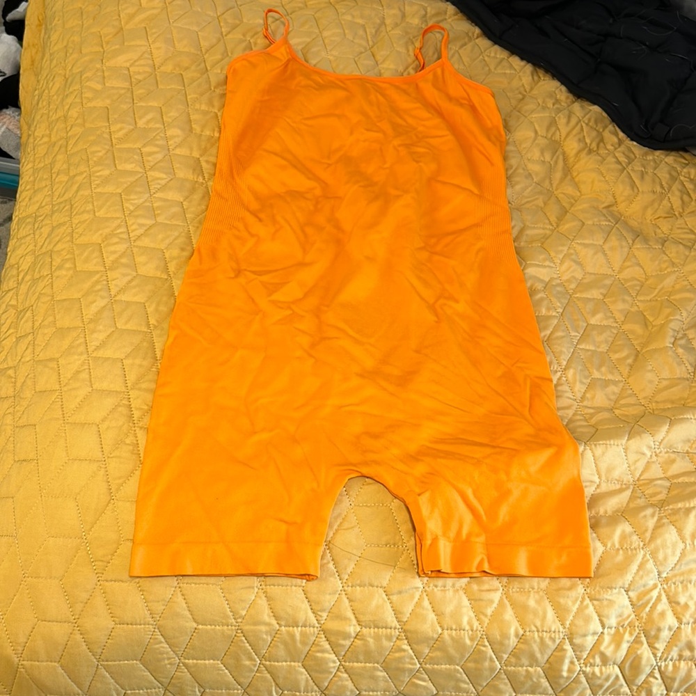 Small Forget Me Not Orange Seamless Romper, never worn